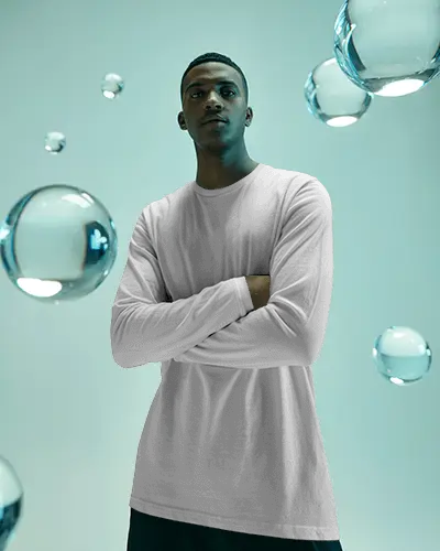 Futuristic Longsleeve Tshirt Mockup Male Model Surrounded By Floating Glass Spheres