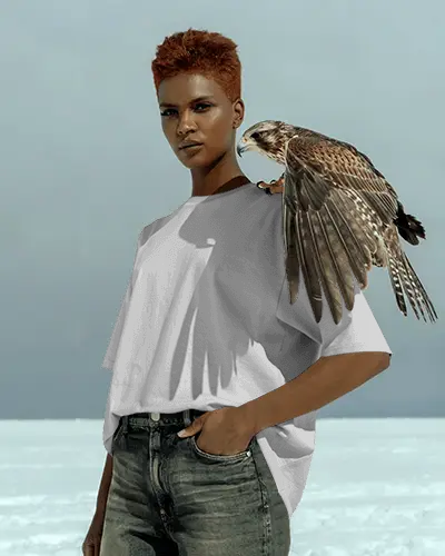 Empowering Outdoor Tshirt Mockup With Falcon On Shoulder And Confident Female Mode