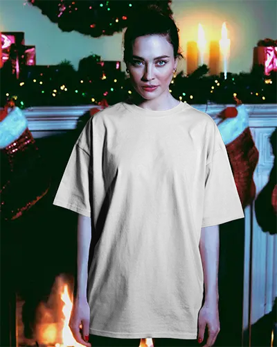 Cozy Christmas Mockup Tshirt Model Standing In Front Of Fireplace With Holiday Decorations