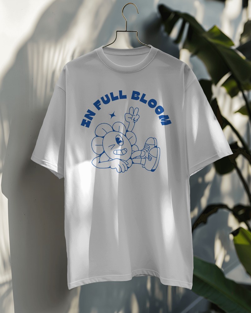 Tshirt Mockup On A Hanger With Cozy Plant In Background