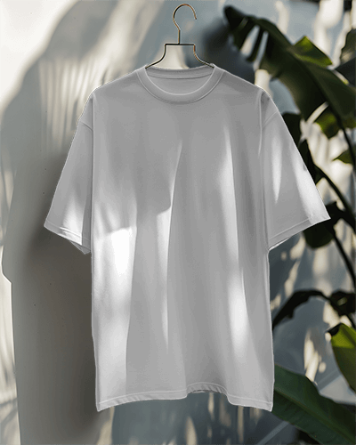 Tshirt Mockup On A Hanger With Cozy Plant In Background