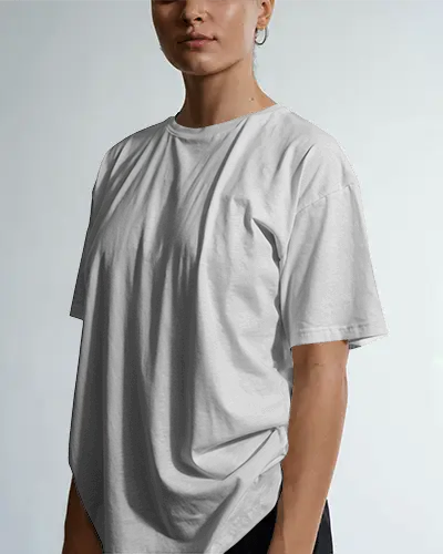 Side Angle T Shirt Mockup Female Model In Soft Neutral Lighting Minimal Studio Look