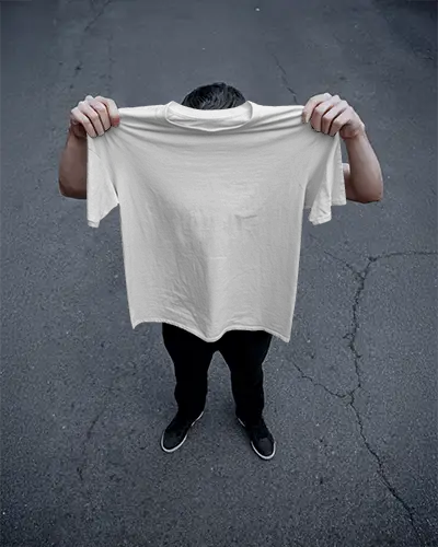 Top Down T Shirt Mockup Hand Held By Model Outdoor Asphalt Background Minimal Street Style