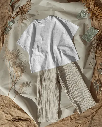 Flat Lay T Shirt Mockup Natural Fabric Styling With Neutral Tones And Organic Props