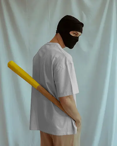 Back View T Shirt Mockup Male Model Standing With Bat Minimal Backdrop Editorial Style