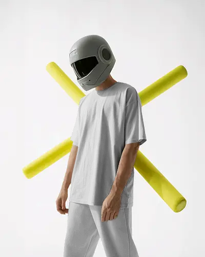 Futuristic Studio T Shirt Mockup Male Model Wearing Plain Tee With Helmet Minimal White Background