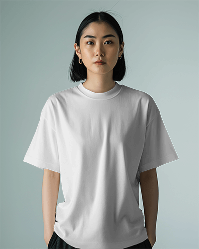 Oversized Tshirt Mockup Of Asian Woman With Hands In Pocket In Studio