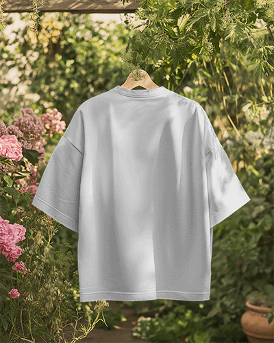 Eco Friendly White Tshirt Mockup Hanging Lush Garden Setting