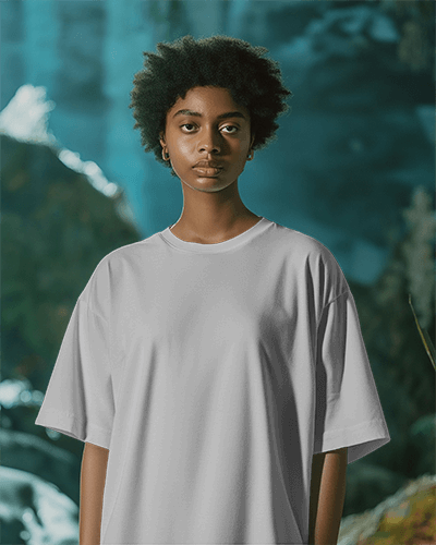Front Facing T Shirt Mockup With Female Model In Tropical Background