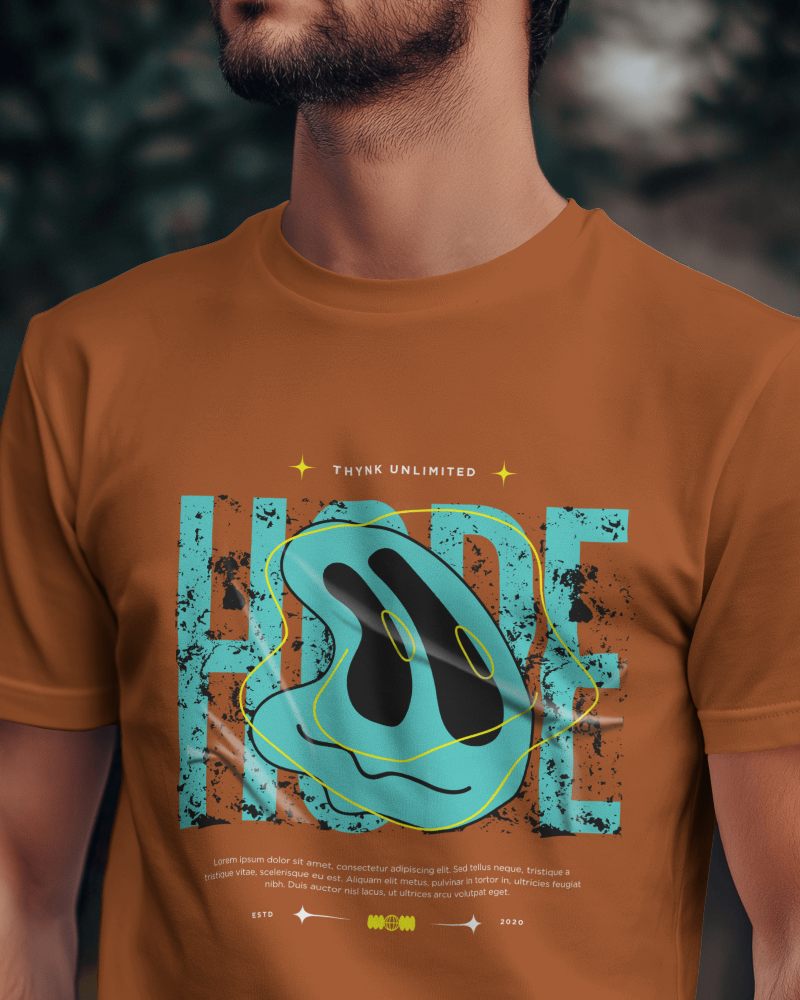 Front Facing White T Shirt Mockup With Custom Design In Dark Indoor Setting