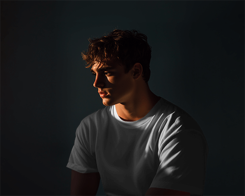 T Shirt Mockup Sidelit Moment In Dark Atmosphere