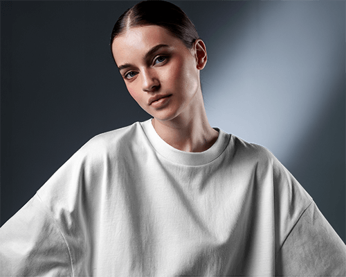 Artistic Spotlight T Shirt Mockup Sleek Bun Hairstyle Female Soft Shadow Lighting