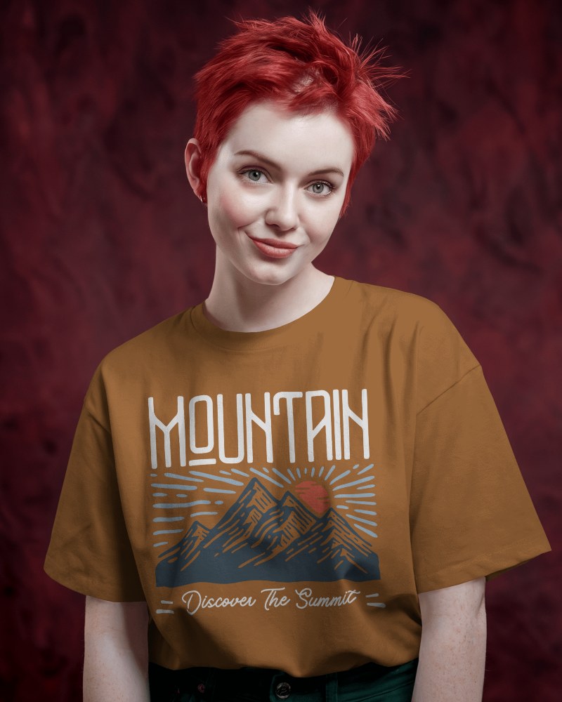 Vibrant Studio T Shirt Mockup Female Model With Red Hair Smiling In Warm Red Background