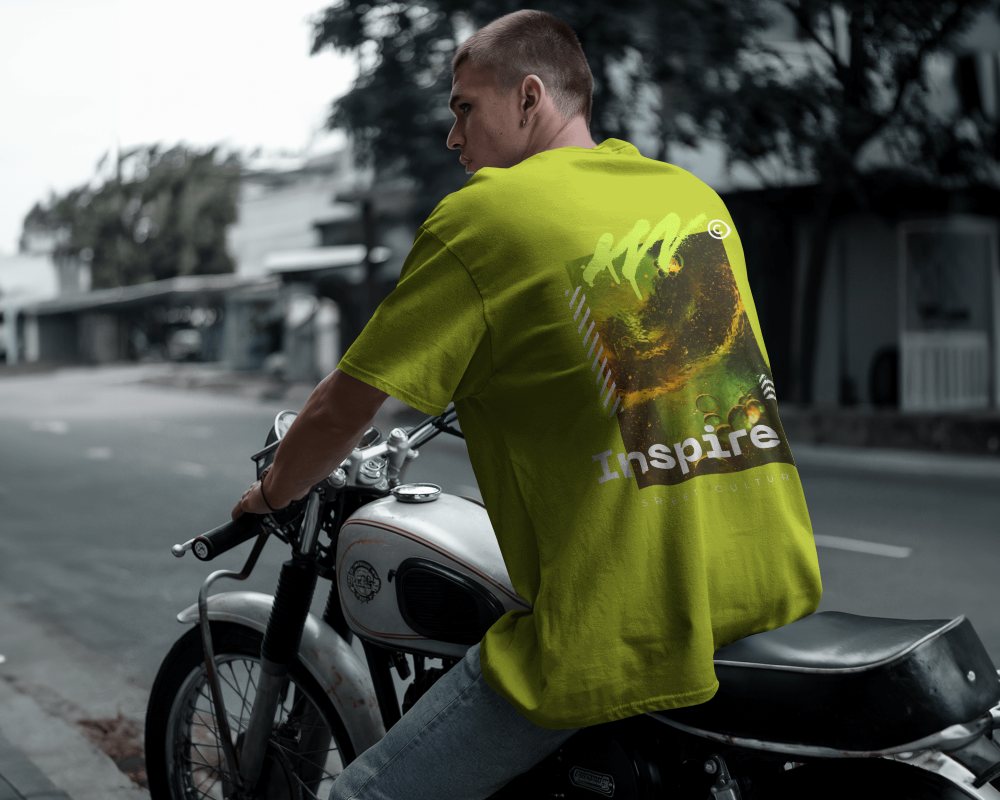 Street Scene T Shirt Mockup Young Man Wearing T Shirt Sitting On Motorcycle With Light Plain T Shirt And Blurred Background