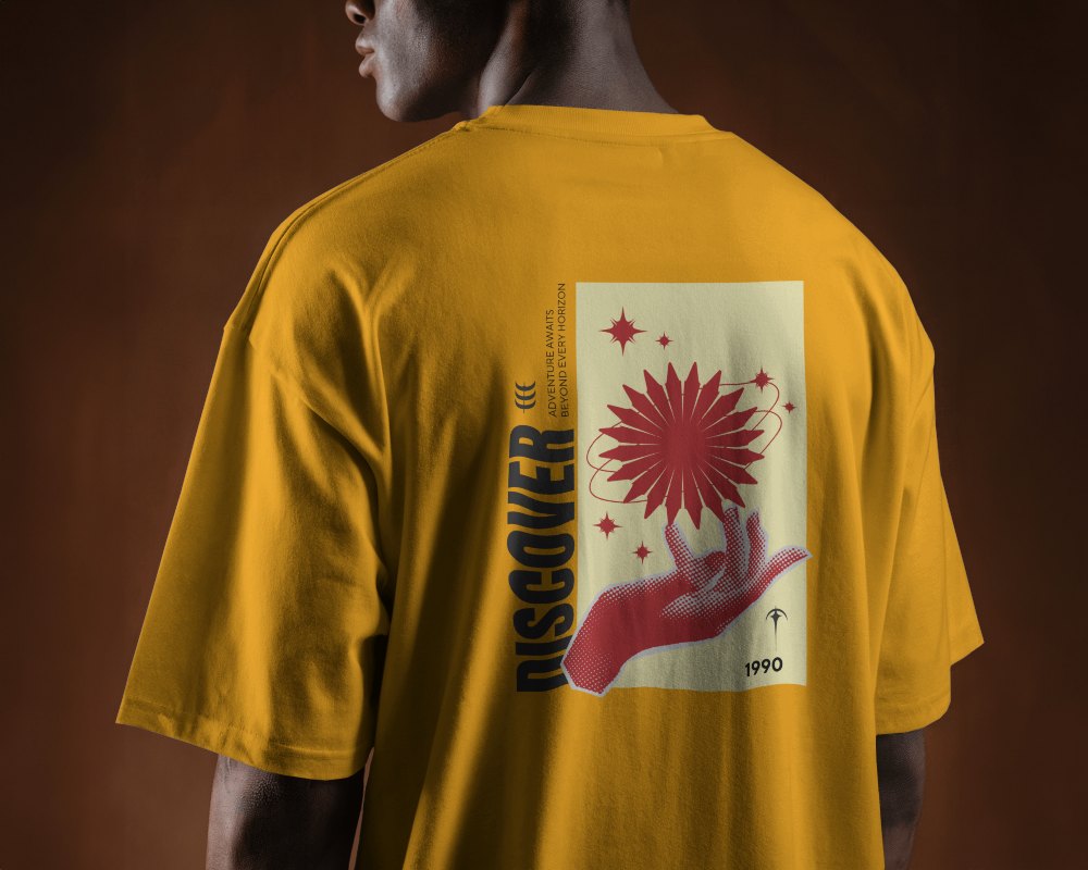 Back View T Shirt Mockup On Male Model In Moody Brown Background Showcasing Relaxed Fit