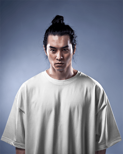 Oversized T Shirt Mockup Male Model With Bun Intense Look In Studio Lighting Modern And Minimalist Style