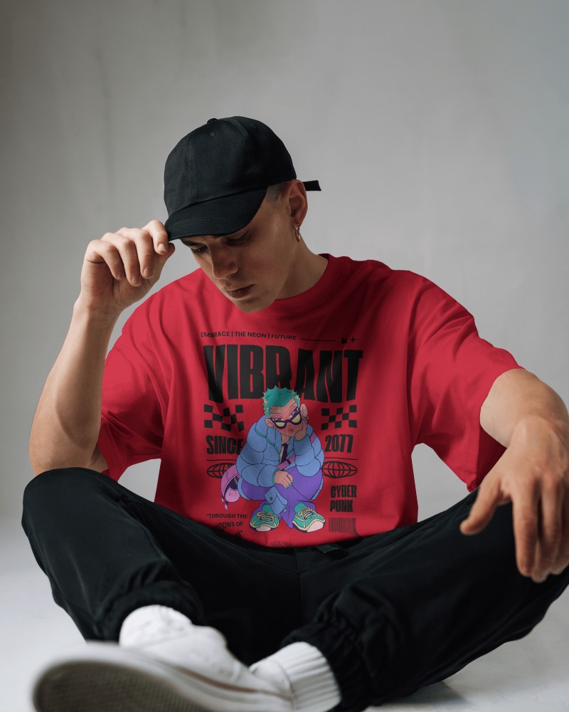 Relaxed Oversized T Shirt Mockup Male Model In Cap Sitting On Floor Streetwear Vibes In Soft Light