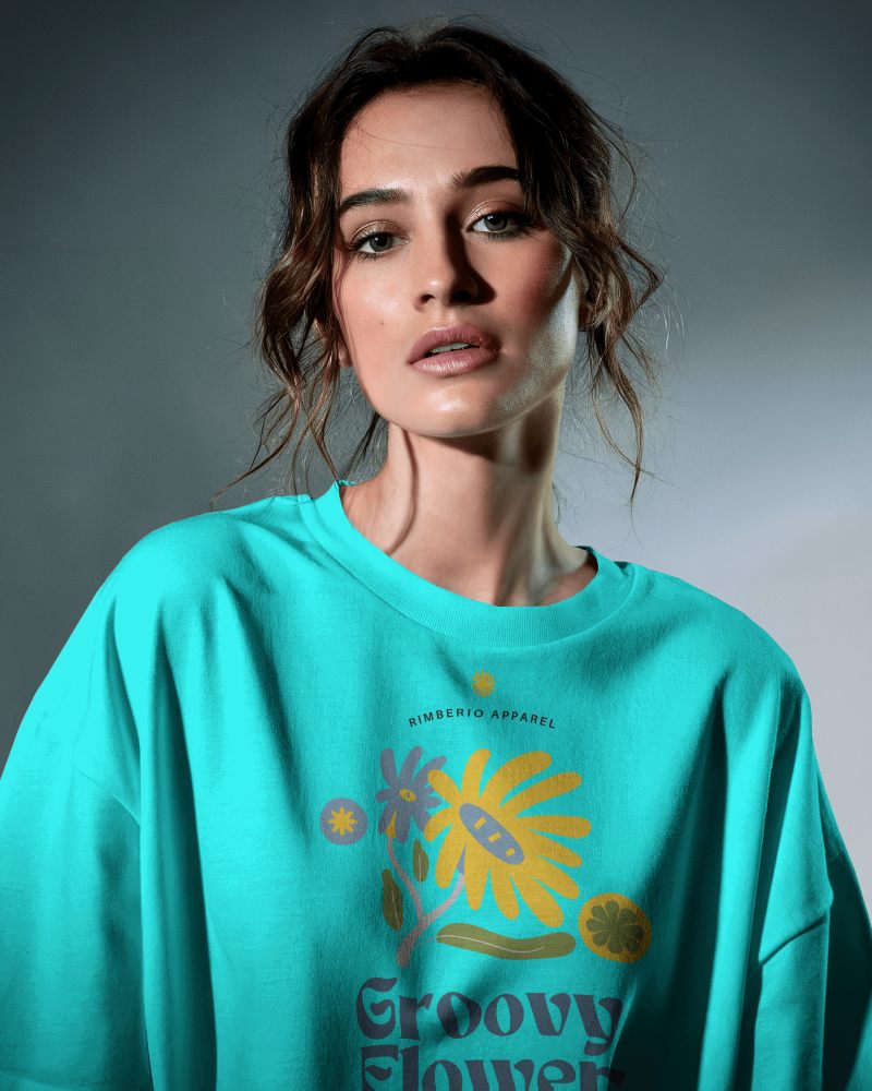 Focused T Shirt Mockup Female Model In Dramatic Studio Lighting