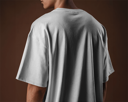 Urban Style T Shirt Mockup Male Model In Soft Dramatic Lighting