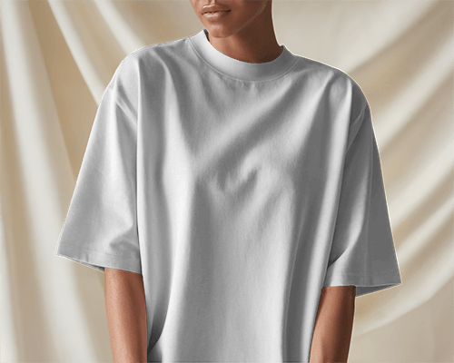 Soft Drape T Shirt Mockup Female Model In Relaxed Fit With Elegant Fabric Backdrop 0595