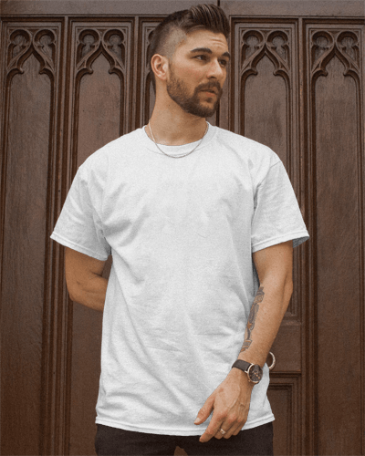 Model In Tshirt Mockup In Front Of Wooden Wall
