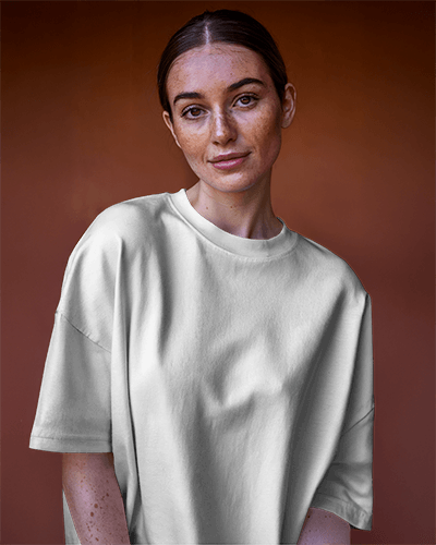 Natural Portrait T Shirt Mockup On Female Model With Earthy Toned Background Soft And Authentic Look 0625