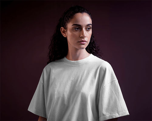 Confident Female Model In Oversized T Shirt Mockup With Moody Dark Background Modern And Sophisticated Look 0627