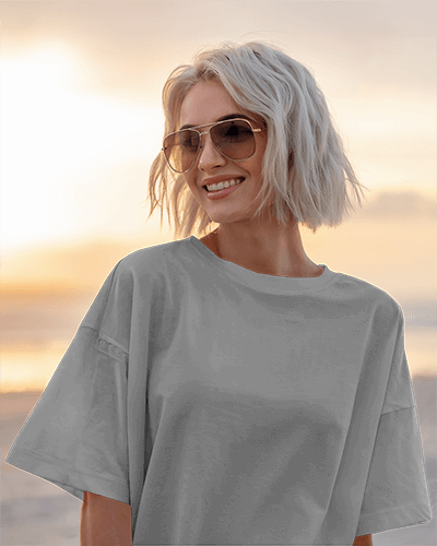Sunlit Beach T Shirt Mockup Smiling Female Model Relaxed Sunset Vibes Casual And Trendy Design Showcase 0662