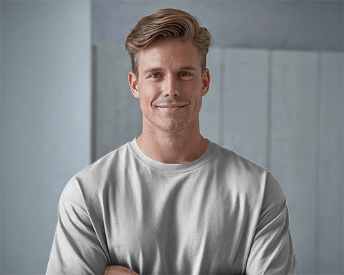 Smiling Male Model T Shirt Mockup Modern Minimalist Background Soft Natural Lighting Casual And Approachable Ambience 0688
