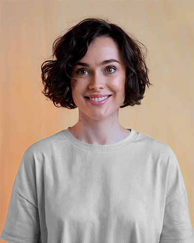 Smiling Female Model T Shirt Mockup Soft Warm Background Clean And Minimalist Look 0692