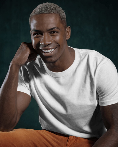 Smiling Male Model T Shirt Mockup Dark Green Background Clean And Modern Minimalist Look 0698