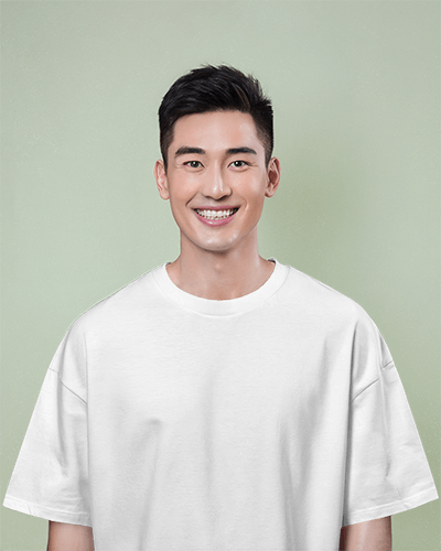 Clean Studio T Shirt Mockup Male Model Smiling Forward On Soft Pastel Background Casual And Inviting 0720