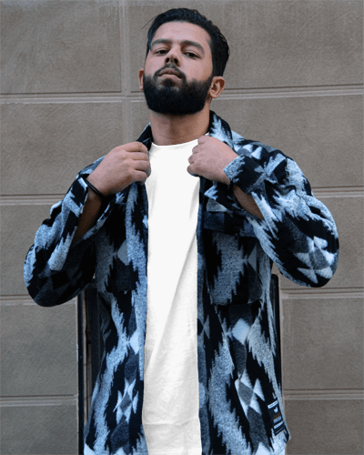 Man Wearing Tshirt Mockup Below Pattern Shirt