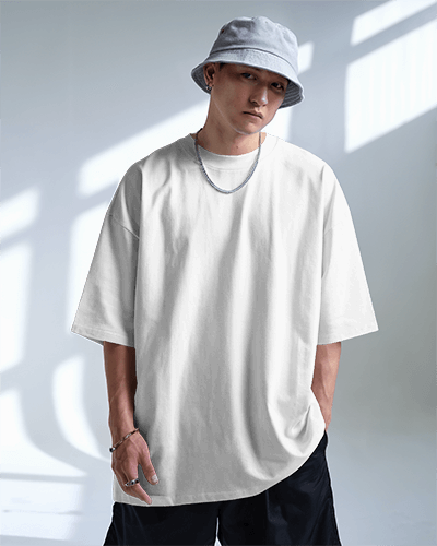 Urban Streetwear T Shirt Mockup Male Model In Oversized Tee And Bucket Hat Soft Natural Lighting Casual Modern Aesthetic 0748