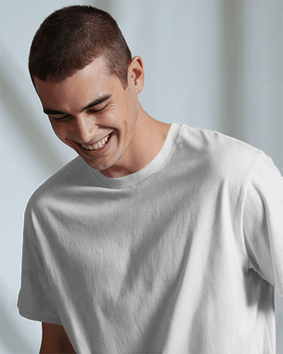 Natural Light T Shirt Mockup Smiling Male Model Soft Shadows And Minimal Background Relaxed And Casual Vibe 0766