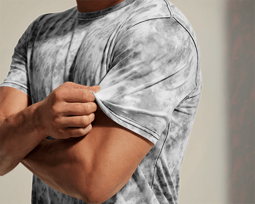 Acid Wash T Shirt Mockup Male Model Flexing Arm And Pulling Sleeve Textured Casual Athletic Look 0768