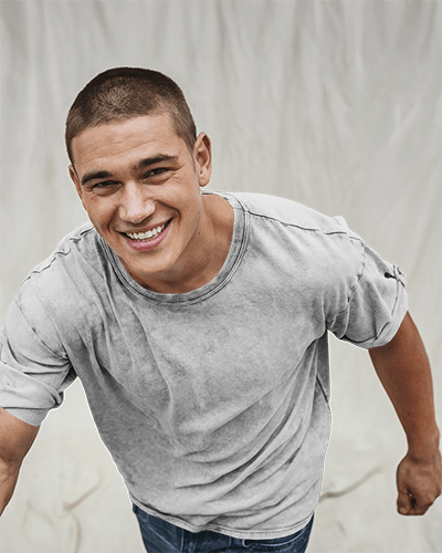 Outdoor Casual Acid Wash T Shirt Mockup Male Model Smiling In Light Washed Fabric Relaxed And Approachable Look 0771