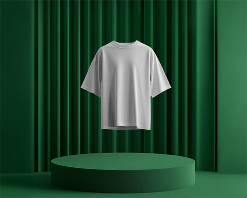 Modern Without People Unisex White Blank Oversized Round Neck T Shirt Mockup Floating On Green Stage With Draped Curtain Background Minimalist And Elegant Display 0779