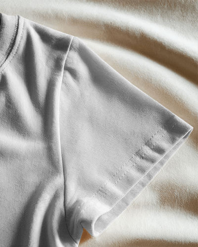 Angled Sleeve T Shirt Mockup On Soft Fabric Surface Natural Lighting And Subtle Wrinkles Minimal And Realistic Presentation 0886