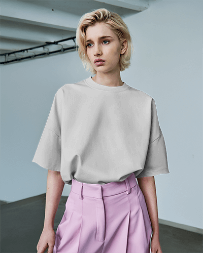 Modern Oversized T Shirt Mockup Female Model In Minimal Industrial Setting Effortless And Trendy Aesthetic 0789
