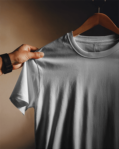 Moody Hanging T Shirt Mockup Hand Holding Wooden Hanger Dramatic Lighting Elegant And Minimalist Aesthetic 0812