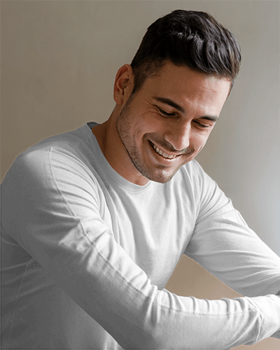 Smiling Male Model Long Sleeve T Shirt Mockup Relaxed Pose Soft Natural Lighting Warm And Casual Ambience 0855