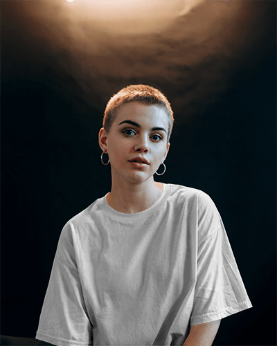 Modern Portrait T Shirt Mockup Female Model With Buzzcut Wearing White Tee In Moody Studio Lighting Minimalist And Edgy Aesthetic 0861