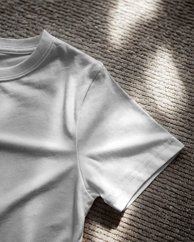 Soft Shadow Flat Lay White T Shirt Mockup On Textured Carpet Cozy Natural Lighting And Minimalist Aesthetic 0876