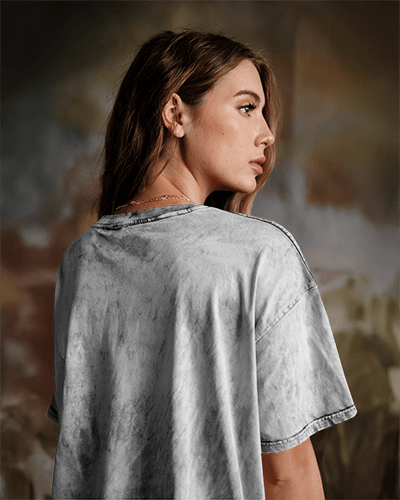 Artistic Backdrop Acid Wash T Shirt Mockup Female Model Looking Sideways Moody Lighting And Trendy Urban Aesthetic 0879