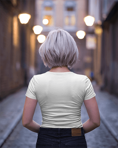 Urban Evening Back View Blank White Tshirt Mockup Short Haired Female In Fitted Tee On Cobblestone Street Soft Glow City Lights Minimal And Modern Vibe 0885