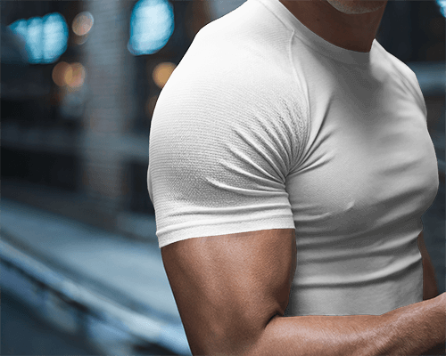 Urban Night Fit Blank White Athletic Tshirt Mockup Muscular Male Model Close Up On Arm And Chest Designs Moody City Background Bold And Sporty Style 0894
