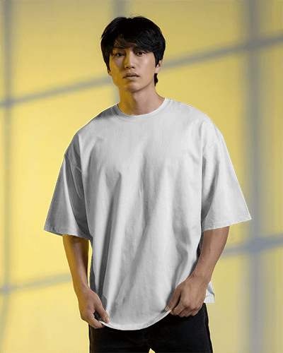 Blank White Round Neck Short T Shirt Mockup Male Model Front Facing In Studio Lighting Against Yellow Background Minimal And Modern Style 0898