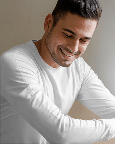 Smiling Male Model Long Sleeve T Shirt Mockup With Soft Light And Relaxed Casual Feel 0906