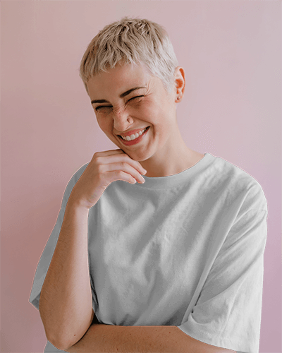 Playful Tshirt Mockup Smiling Female Model With Short Hair In Relaxed Pose Against Soft Pink Background Lighthearted And Modern Style 0910